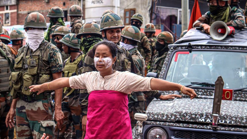 Community leaders addressing supporters after the lifting of an emergency shutdown in Manipur.