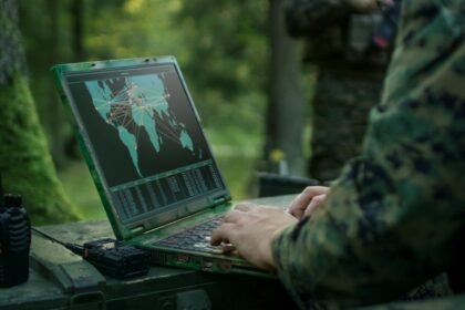 Border security personnel monitoring an international boundary using advanced surveillance systems.