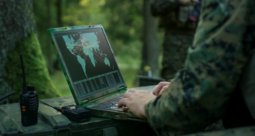 Border security personnel monitoring an international boundary using advanced surveillance systems.