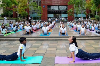 Indian Army Chief General Upendra Dwivedi leading a large group yoga session during the 12th International Yoga Day celebrations in Tezpur, Assam.