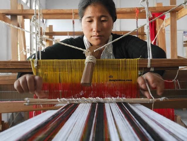Tribal weavers display vibrant handwoven textiles at a week-long exhibition in Itanagar, celebrating Arunachal Pradesh's rich cultural heritage and supporting local artisans.