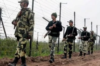 Security personnel monitor infrastructure upgrades and border fencing installations along the India-Myanmar frontier.