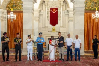 The NorthEast United FC "Highlanders" squad receives special honors during a ceremonial event at Rashtrapati Bhavan in recognition of their football achievements.