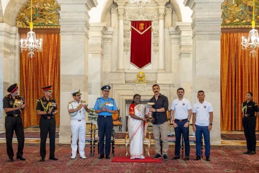 The NorthEast United FC "Highlanders" squad receives special honors during a ceremonial event at Rashtrapati Bhavan in recognition of their football achievements.