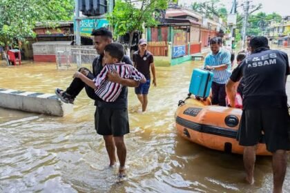 Flood-affected families stay in a government relief camp where officials provide temporary shelter and essential assistance as part of Assam's ongoing flood response.