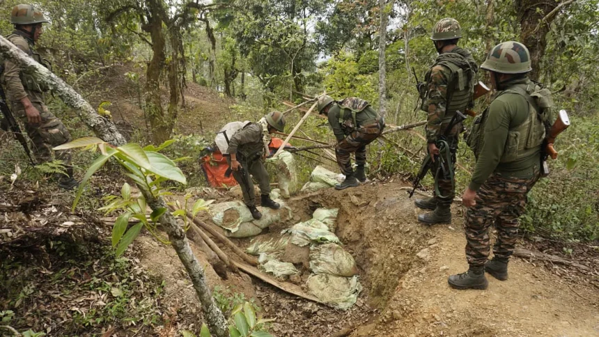 Security personnel conducting search operations in Manipur as part of efforts to recover illegally held weapons.
