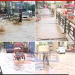 Floodwaters cover commercial streets in Guwahati as artificial flooding disrupts business areas and daily movement across the city.