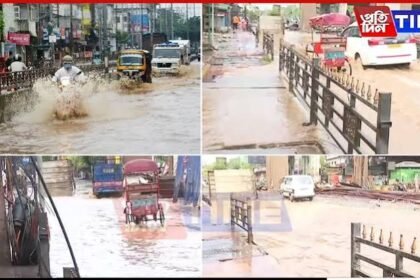 Floodwaters cover commercial streets in Guwahati as artificial flooding disrupts business areas and daily movement across the city.