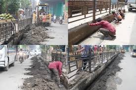 Engineers review highway drainage designs with technical experts from IIT Guwahati assessing plans for improved water management and infrastructure resilience.