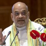 Union Home Minister Amit Shah addressing a public event while discussing the phased withdrawal of AFSPA from Northeast India.