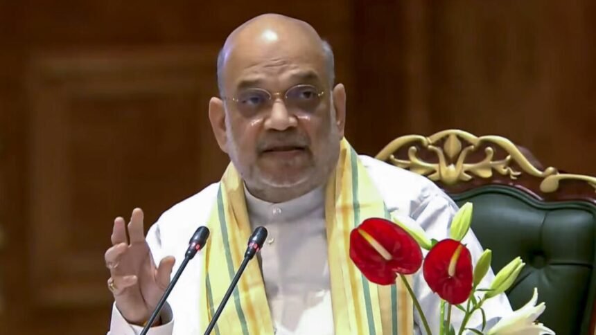 Union Home Minister Amit Shah addressing a public event while discussing the phased withdrawal of AFSPA from Northeast India.