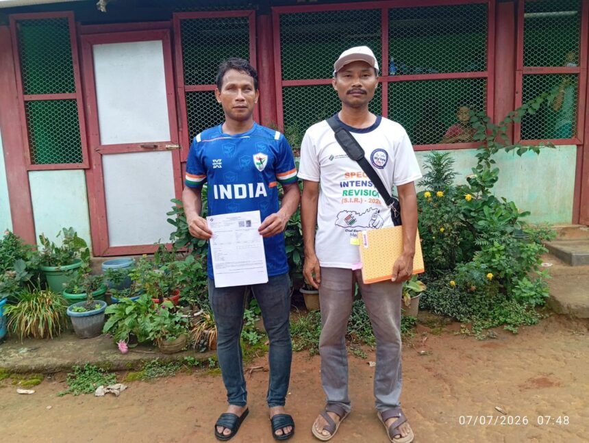 Sports icon Klingson D. Marak receives electoral roll enumeration forms during the official launch of Meghalaya's voter list revision campaign.