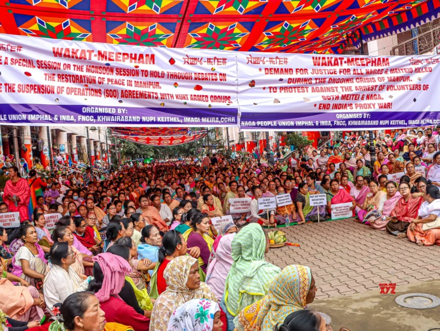 Civil society members participate in a peaceful sit-in protest in Imphal, calling for greater security accountability amid ongoing civilian unrest.