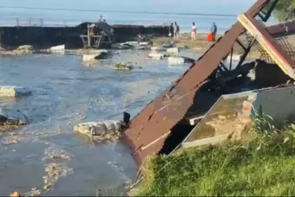 Riverbank erosion damages residential areas in Rohmoria, Dibrugarh, where homes are destroyed due to severe land loss along the river.