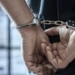 Security personnel display seized contraband after arresting a husband-and-wife duo during an anti-infiltration border enforcement operation.