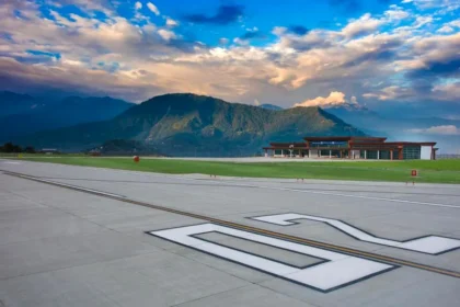 Pakyong Airport runway surrounded by hilly terrain as authorities seek emergency funds for runway slope repair work.