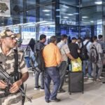 Security personnel conduct enhanced inspections of commercial vehicles and cargo at the Zokhawthar border point in Champhai as part of strengthened anti-smuggling measures.