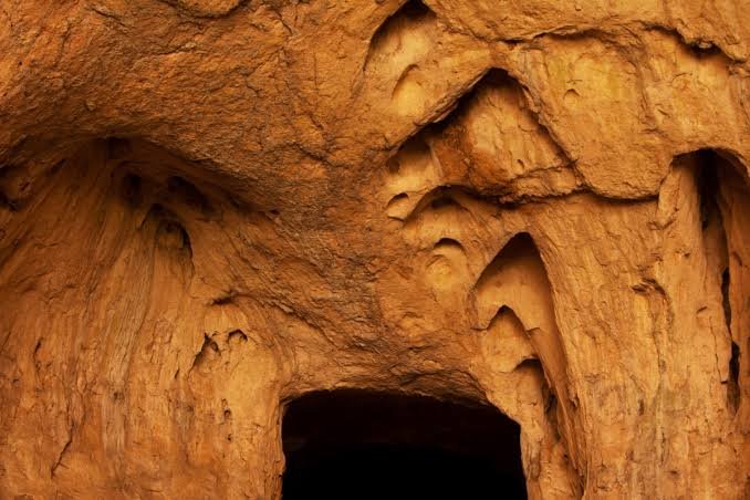 Researchers conduct subsurface geological testing inside the limestone cave system of Phokhungri to investigate potential Pleistocene fossil deposits.