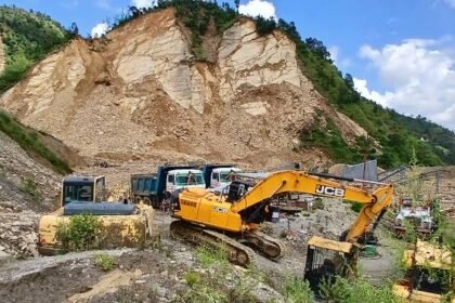 Heavy crane teams reportedly recover civilian cars trapped in deep mud following severe flooding in Nepali Khuti village.
