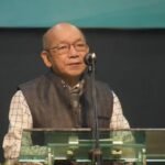 Mizoram Home Minister K. Sapdanga addresses officials during a meeting while discussing the need for a clear Central Government policy on Zo ethnic refugees.