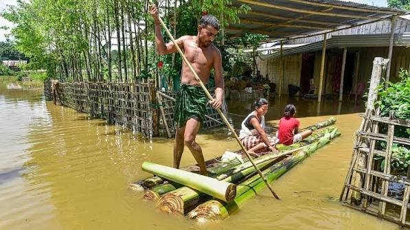 Flood-affected residents receive temporary shelter at designated relief camps established by district administrations in Assam.