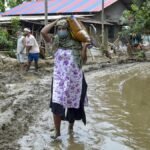 Flood-affected residents in Assam receive emergency support as authorities report 1.55 lakh people impacted across five districts.