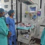 Medical staff work inside newly established advanced newborn care units at Mamit District Hospital, providing specialized neonatal care with modern medical equipment.