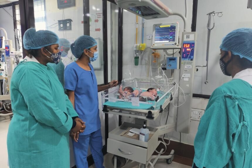 Medical staff work inside newly established advanced newborn care units at Mamit District Hospital, providing specialized neonatal care with modern medical equipment.