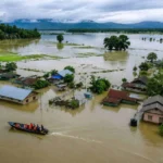 Fast-flowing rain-fed river descends through the hills of Nagaland after intense cloudbursts, carrying large volumes of water downstream toward Assam.