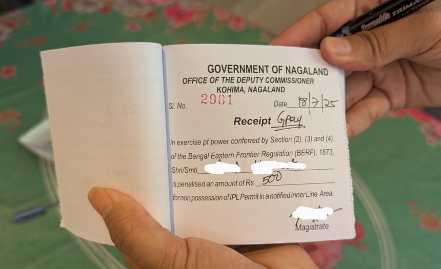 Nagaland Police officers verify Inner Line Permit documents during inspections at commercial business establishments across the state.