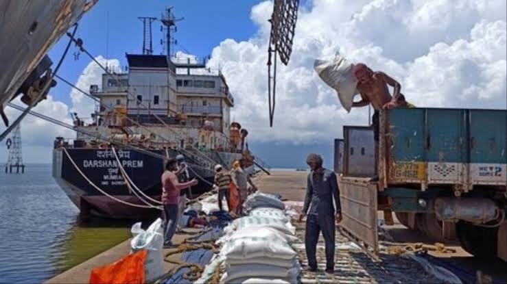 Trucks and goods movement at Dawki land port affected by heavy monsoon rains during India-Bangladesh cross-border trade operations.