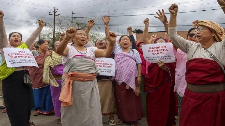 Women-led civil society groups demonstrate outside the Manipur Legislative Assembly while demanding faster government resolutions.