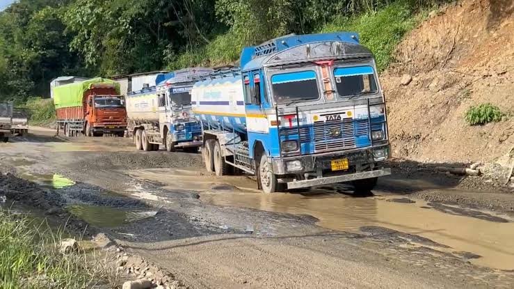 Public Works Department teams clear debris from the NH-2 highway in Kangpokpi, restoring road connectivity and ensuring safer travel during the monsoon season.