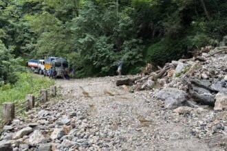Heavy mudslides block the highway near Sela Pass, temporarily isolating Tawang as road clearance teams monitor conditions during the monsoon.