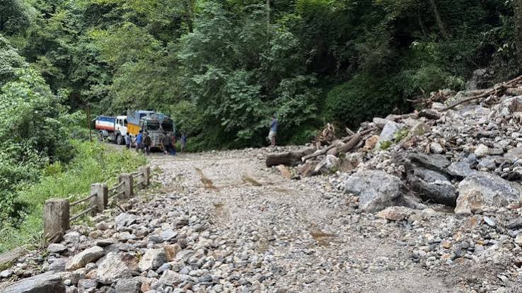 Heavy mudslides block the highway near Sela Pass, temporarily isolating Tawang as road clearance teams monitor conditions during the monsoon.