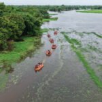 The Dhansiri river near Numaligarh flows under severe flood conditions as authorities monitor rising water levels during the monsoon season.