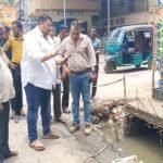Workers clear a major storm drain in Agartala as part of the city’s drainage overhaul efforts to improve flood prevention.
