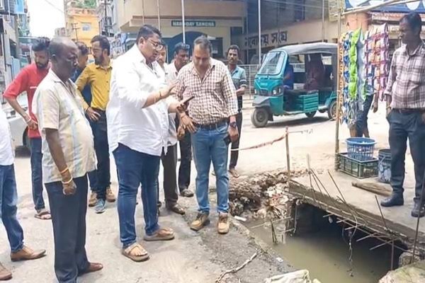 Workers clear a major storm drain in Agartala as part of the city’s drainage overhaul efforts to improve flood prevention.