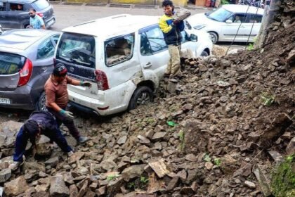 Rain-affected residential areas in Tura after three retaining walls collapse due to soil saturation during heavy monsoon rainfall.