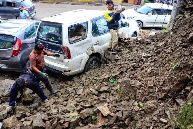 Rain-affected residential areas in Tura after three retaining walls collapse due to soil saturation during heavy monsoon rainfall.