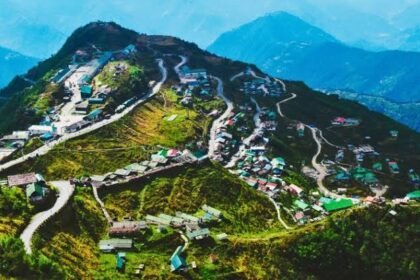 Tourists overlook Gangtok city while mountain roads remain affected by conditions that contributed to a decline in domestic visitor arrivals.