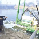 Municipal workers use heavy machinery to remove silt and debris from drainage channels in Dimapur as part of an urgent initiative to prevent urban waterlogging.