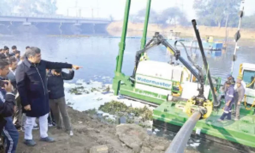 Municipal workers use heavy machinery to remove silt and debris from drainage channels in Dimapur as part of an urgent initiative to prevent urban waterlogging.