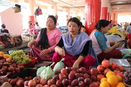 Women vendors serve customers at the bustling Ima Keithel market in Imphal as record weekend trade signals renewed economic activity and community confidence.