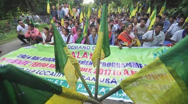 CPI(M) leaders welcoming tribal supporters who reportedly left the BJP during a political joining programme in Dhalai district.