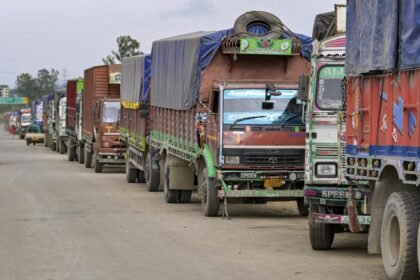Trucks remain stranded along a Manipur highway as the United Naga Council intensifies its indefinite economic blockade.