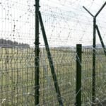 Security fencing along Tripura’s international border with Bangladesh representing the state’s extensive border infrastructure.