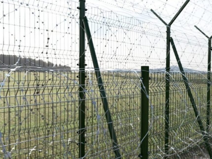 Security fencing along Tripura’s international border with Bangladesh representing the state’s extensive border infrastructure.