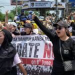 Protesters in Manipur participate in a rally demanding an NRC update before the Census.